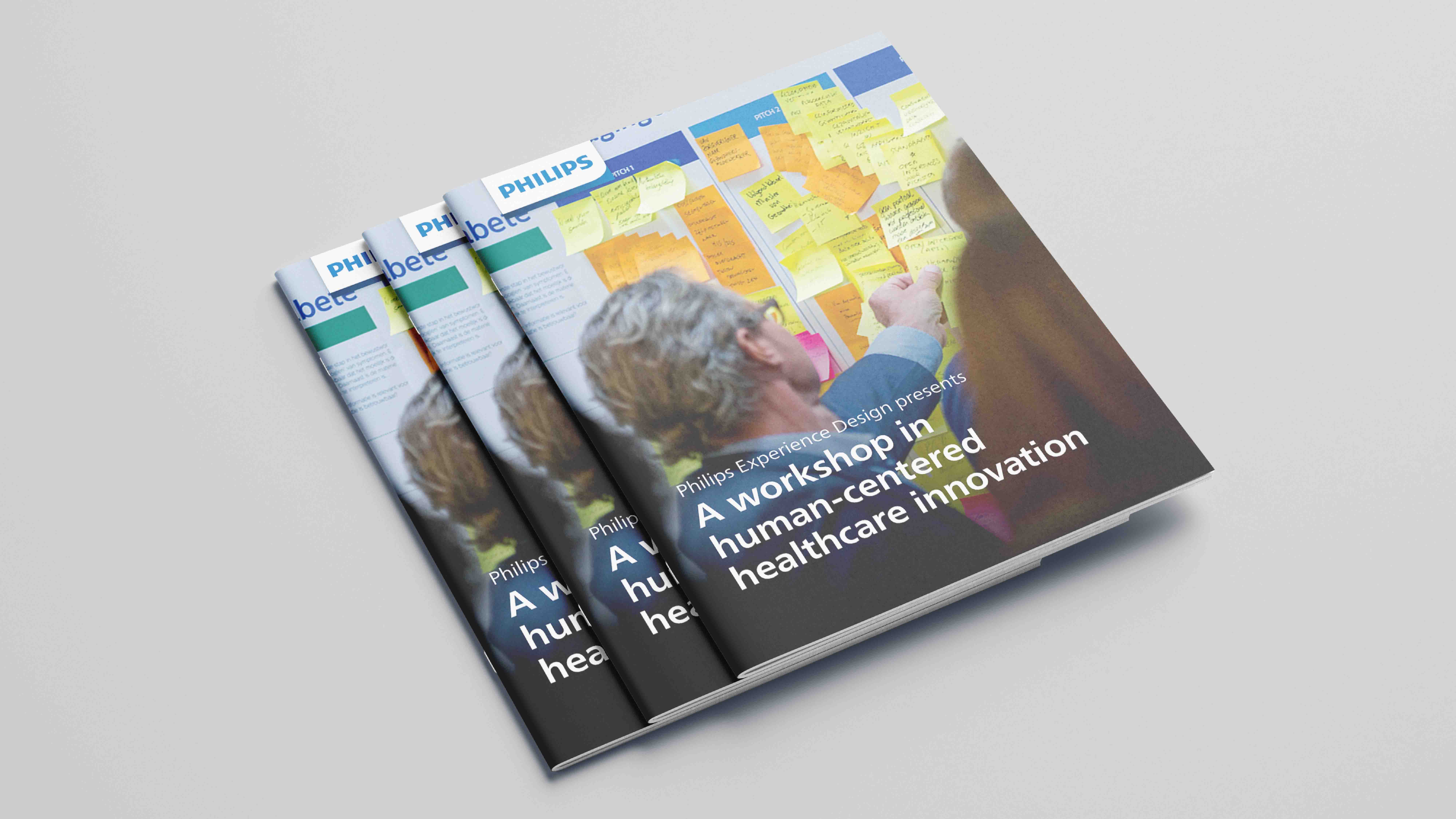 Three booklets set ontop of each other. The cover has typofraphy and a man placing sticky notes on a wall. Booklet was made in Adobe illustrator and Adobe Indesign